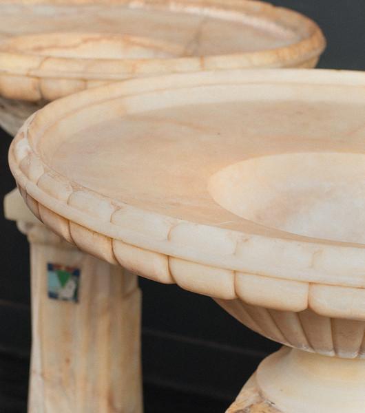 Pair of Spectacular Carved Onyx Pedestal Planters